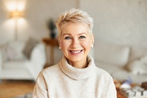 Woman after receiving dental crowns