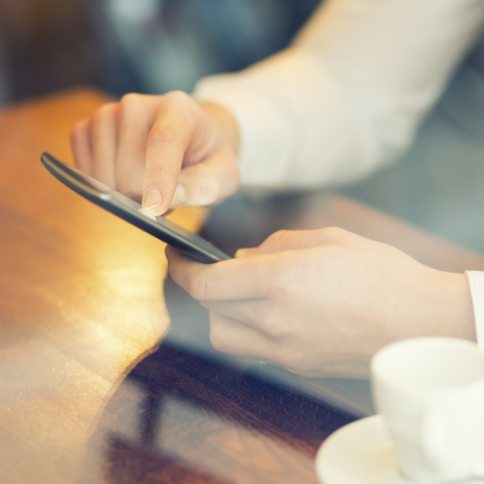 Dental patient completing forms on a smartphone