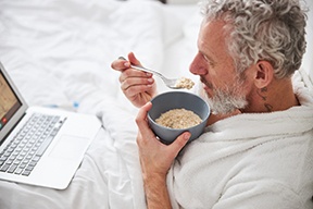 Man eating oatmeal