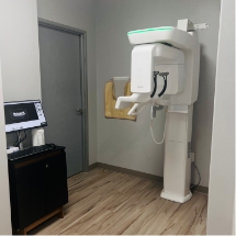 Cabinets in between two fish tanks in dental office in Arlington