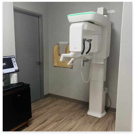 Woman receiving 3 D C T cone beam digital dental x ray scan