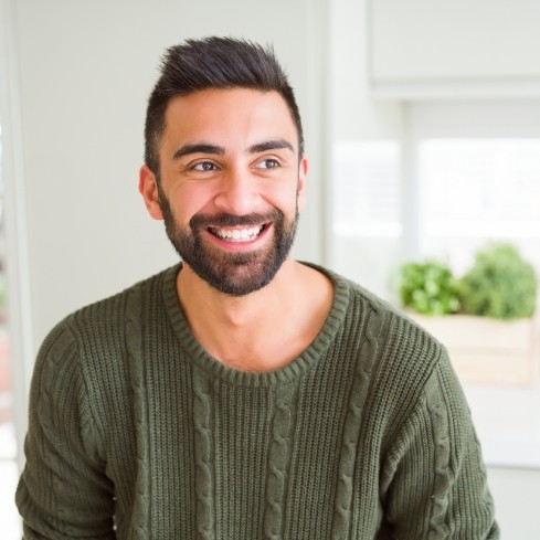 Man with flawless smile after cosmetic dentistry