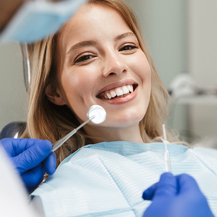 Closeup of woman smiling during dental checkup