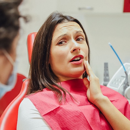 Woman at the dentist with a toothache