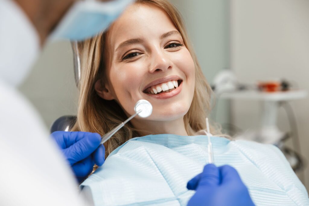 Woman in dental chair about to undergo exam